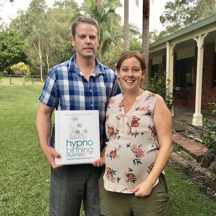 Couple sitting on a couch. Hypnobirthing Australia Course Privately