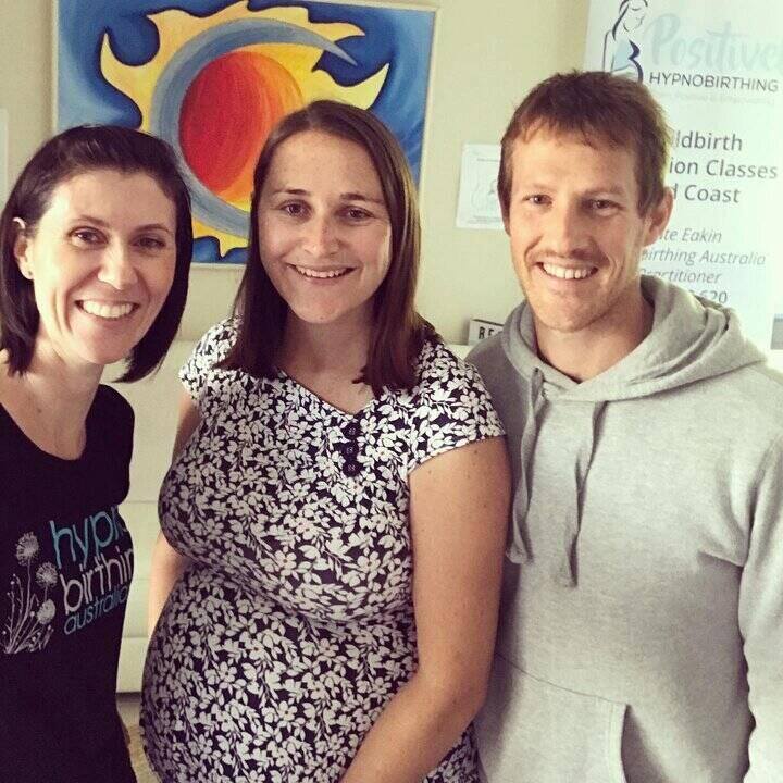 Couple sitting on a couch. Hypnobirthing Australia Course Privately