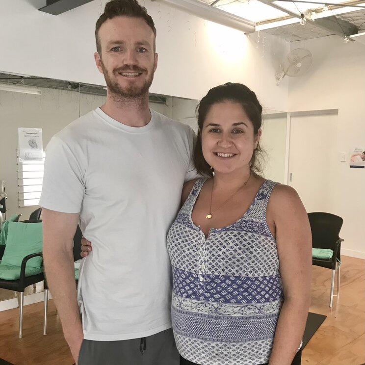 Couple sitting on a couch. Hypnobirthing Australia Course Privately