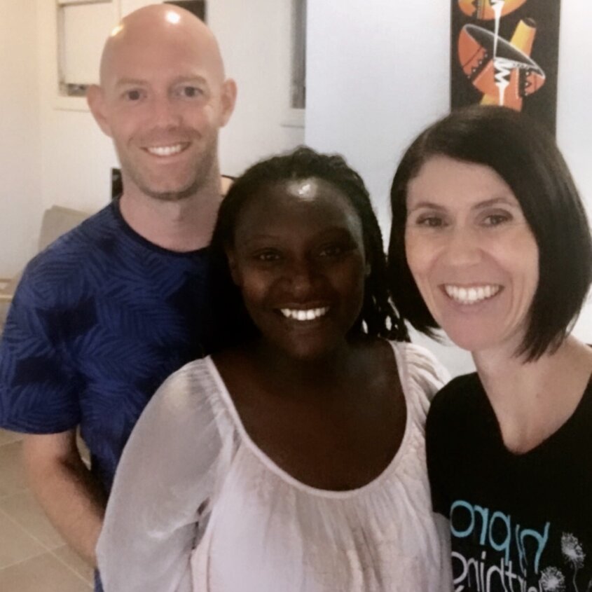 Pregnant couple and Kate hypnobirthing practitioner smiling after hypnobirthing class