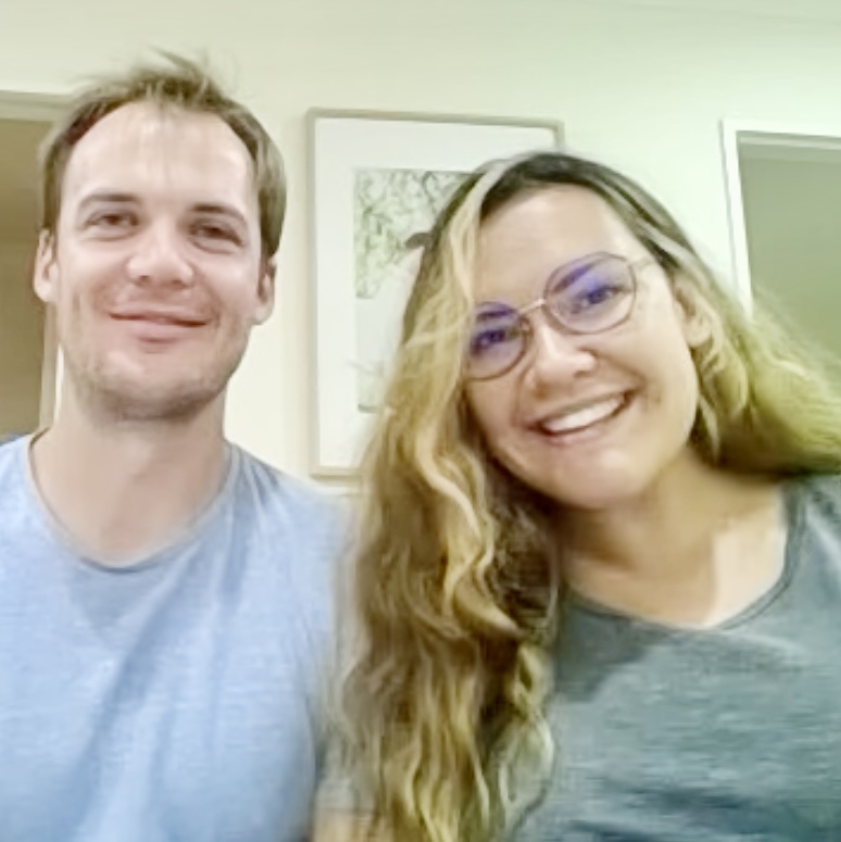 Couple sitting on a couch. Hypnobirthing Australia Course Privately