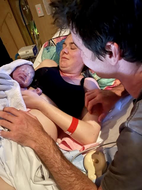 Mum and Dad meeting baby boy for first time after the birth