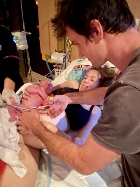 Mum and Dad meeting baby boy for first time after the birth