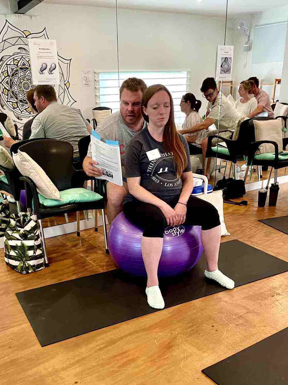 Couple practising Hypnobirthing Techniques at Positively Hypnobirthing Group Course on the Gold Coast