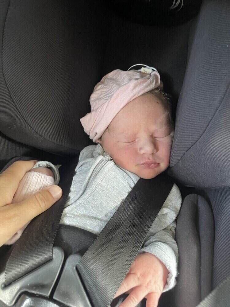 Newborn baby in car seat