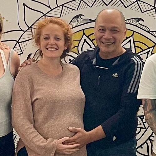 Pregnant couple smiling after completing the Hypnobirthing Australia™ course on the Gold Coast with Positively Hypnobirthing