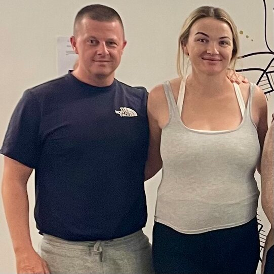 Pregnant couple smiling after completing Hypnobirthing Australia™ course on Gold Coast with Positively Hypnobirthing
