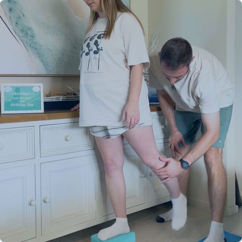 Pregnant couple working on Body Ready Method exercises to prepare for birth