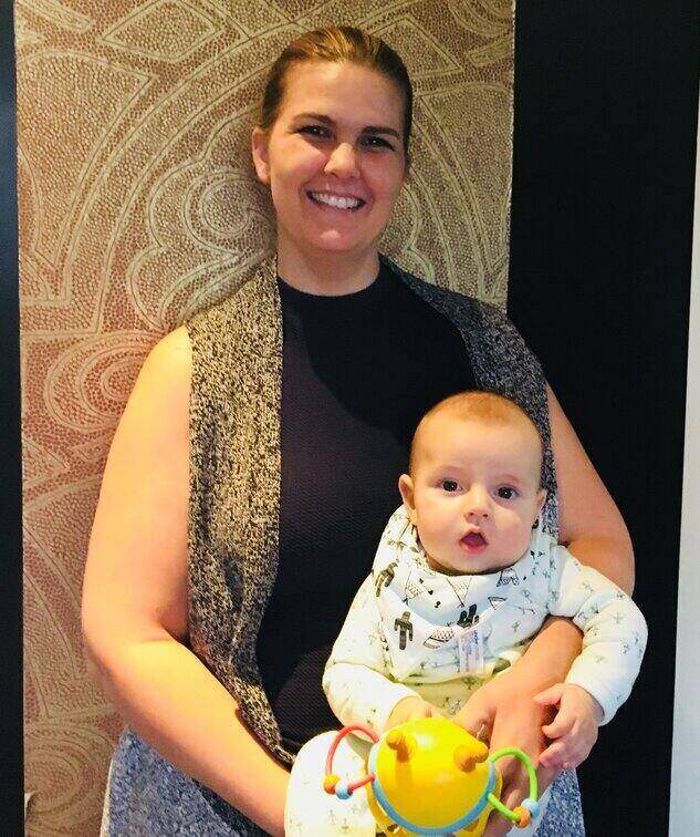 Couple sitting on a couch. Hypnobirthing Australia Course Privately