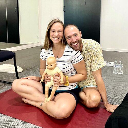 Pregnant couple at Body Ready Birth Workshop Smiling